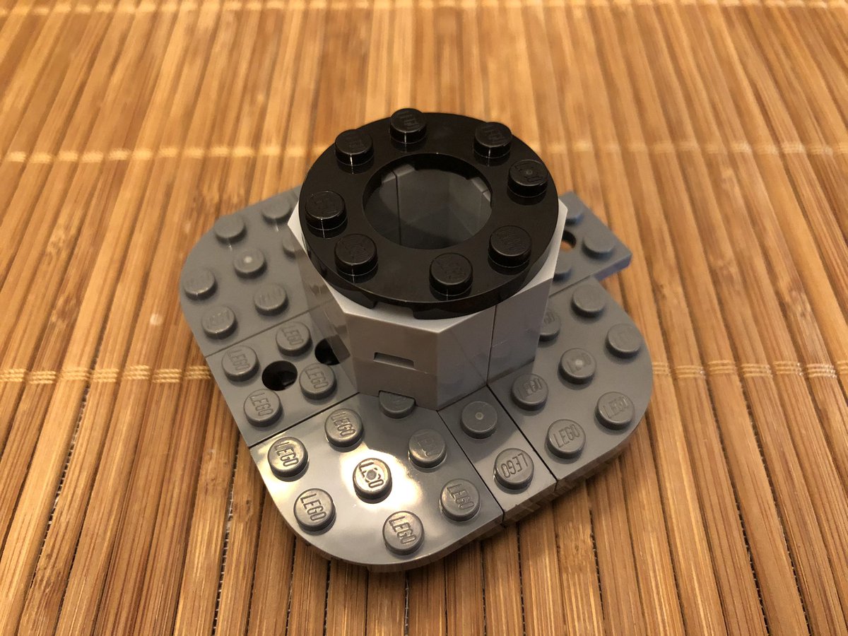 Flip it over and build the tractor beam mechanism, with controls.  #LEGO  