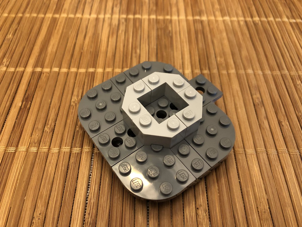 Flip it over and build the tractor beam mechanism, with controls.  #LEGO  