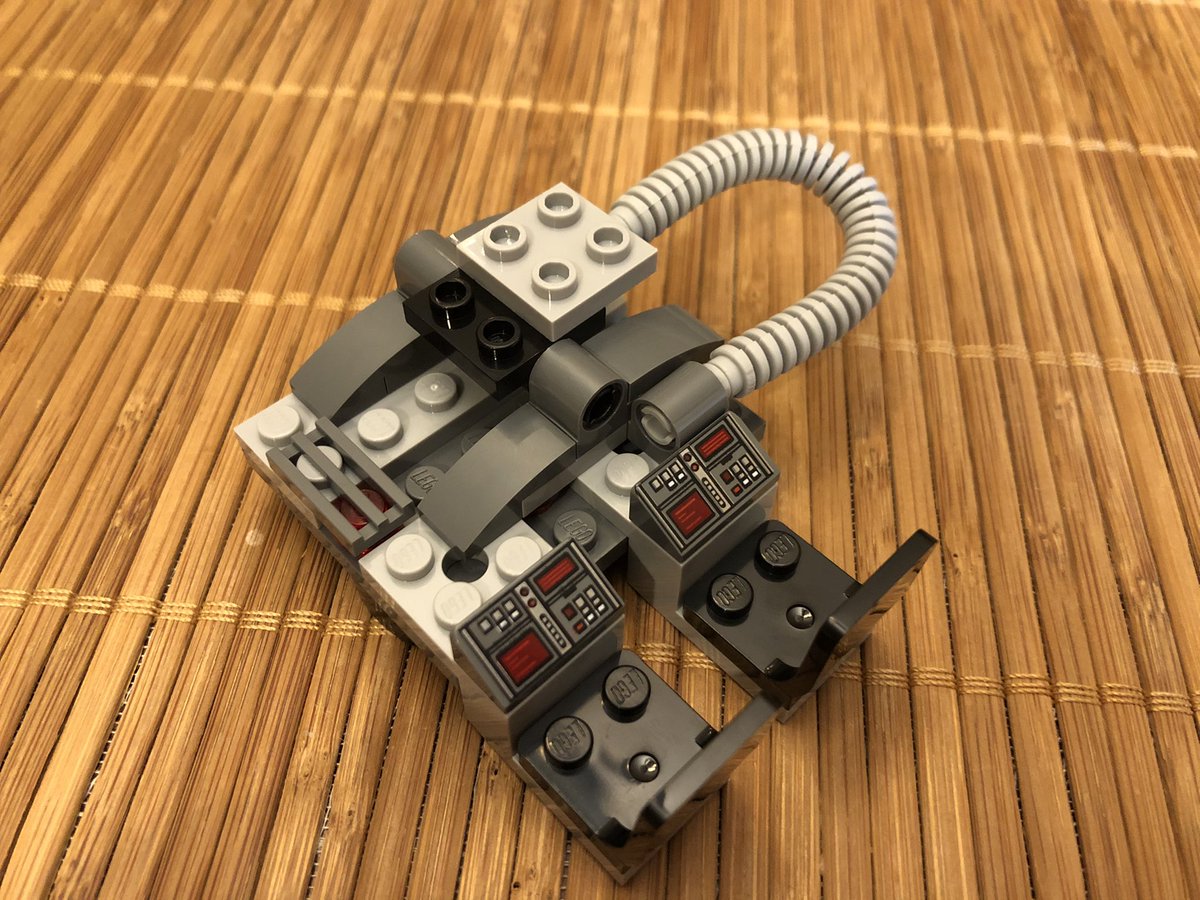 There’s a tilt mechanism on top of this, and some tubing between the base at the tilting portion. What could it be?  #LEGO  
