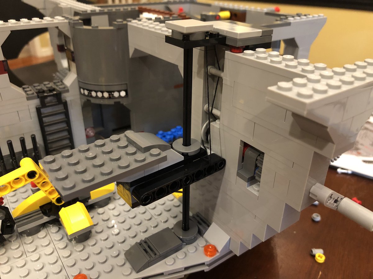 ...tie it around the last strut on the elevator piece, then attach that to the elevator. The crankshaft now raises and lowers the elevator! That’s the end of section 4, I’ve got two more done and pictures coming.  #LEGO  