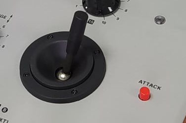 nitpick, but still relevant: they went with a generic black joystick. The attack button also appears to be board-mounted, where as the originals were panel-mount, with a nice chromed steel housing. The original joysticks were beautiful knurled aluminum affairs. a great detail.