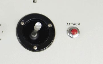 nitpick, but still relevant: they went with a generic black joystick. The attack button also appears to be board-mounted, where as the originals were panel-mount, with a nice chromed steel housing. The original joysticks were beautiful knurled aluminum affairs. a great detail.