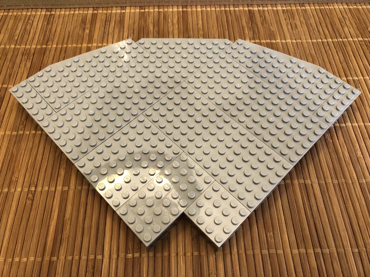 This quadrant goes above the cargo bay. The next section has a cutout on the bottom side, but has a smooth surface. A rotational piece goes in the center, with some decoration around it.  #LEGO  