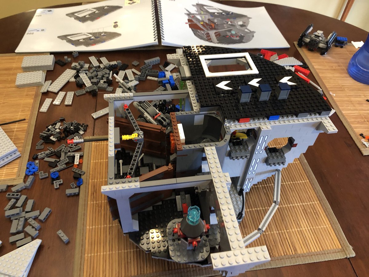 This quadrant goes above the cargo bay. The next section has a cutout on the bottom side, but has a smooth surface. A rotational piece goes in the center, with some decoration around it.  #LEGO  