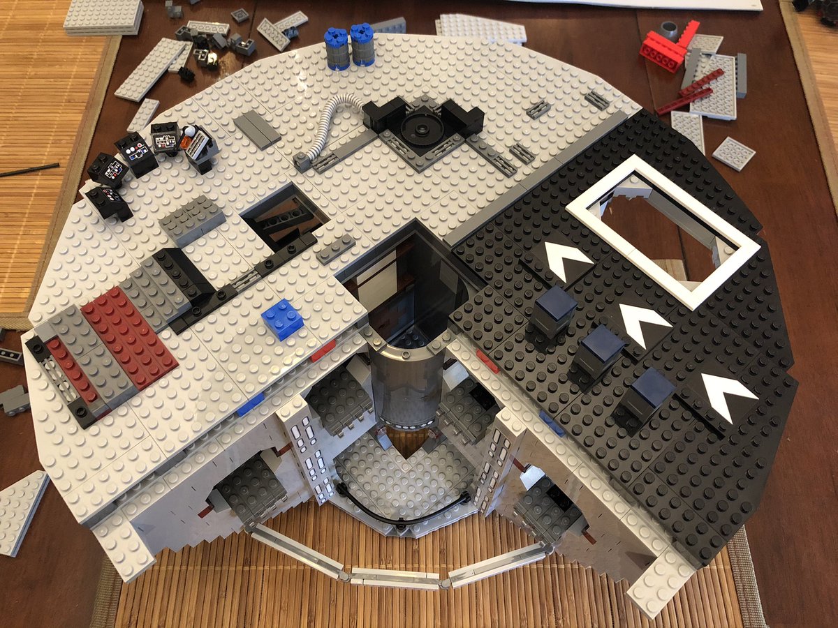 Place the floor counter clockwise, again being careful when securing to the compactor posts.The next floor has two holes, and a recessed area, then some pieces go on the underside.  #LEGO  