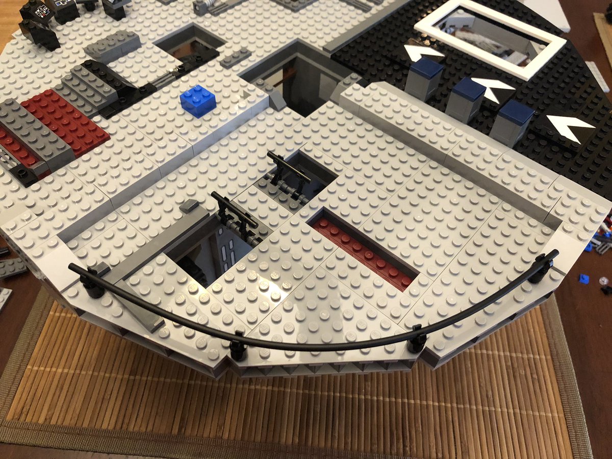 We start in this section, building the walls up. A decal goes on this black panel, but it faces the other way. More and more layers to the walls.  #LEGO  