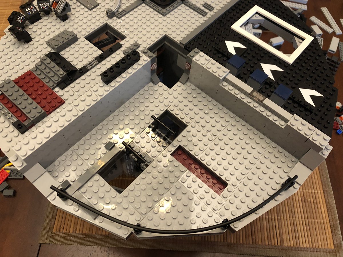 We start in this section, building the walls up. A decal goes on this black panel, but it faces the other way. More and more layers to the walls.  #LEGO  