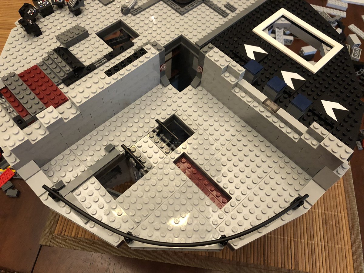 We start in this section, building the walls up. A decal goes on this black panel, but it faces the other way. More and more layers to the walls.  #LEGO  
