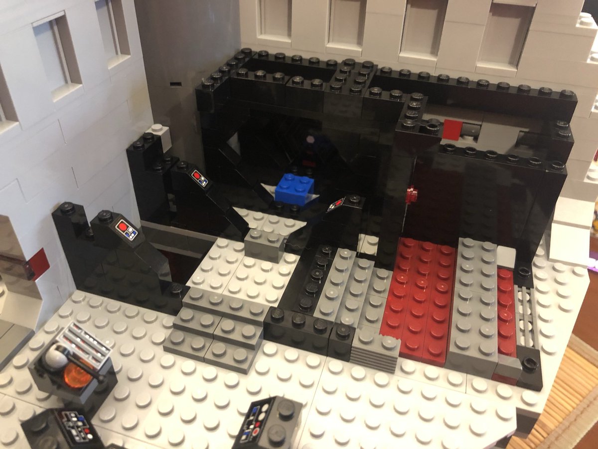 Some more walls go around the gates we just placed, and some sloped pieces around the hole in the floor. It gets covered with a grate that can rotate. Figure it out?  #LEGO  