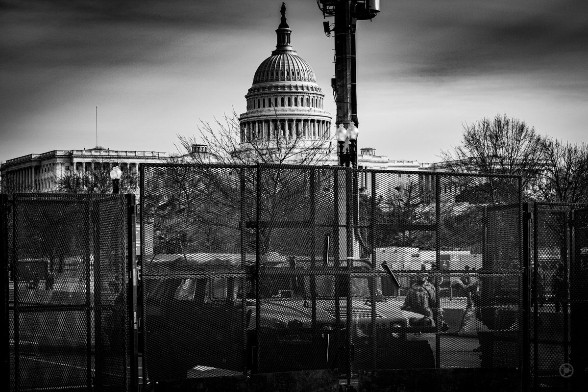 Layers kept getting added as we rounded the northwest wide of the Capitol building, and though the view was clearer, at least 6 barriers separated us from the steps that insurrectionist had climbed just over a week earlier. #DCLockdown  #BenjaPhoto