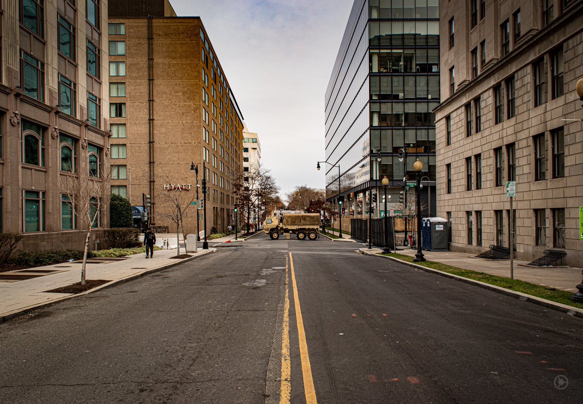 Medium Tactical Vehicles stood waiting the arrival of more fencing, appearing almost as a child’s forgotten toy, out of place on the empty city blocks. #DCLockdown  #BenjaPhoto