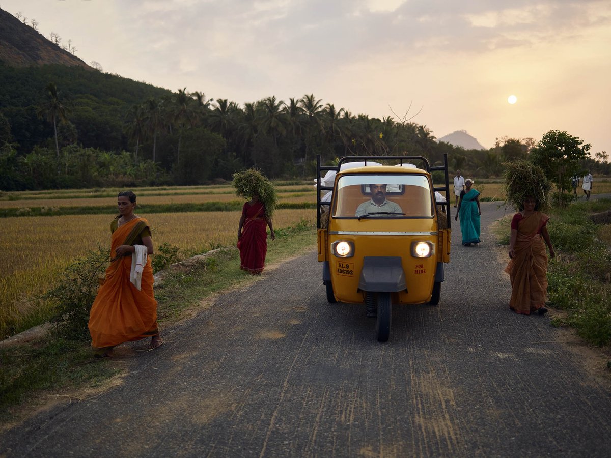 Thankraj, an auto rickshaw driver, transports farming supplies across the countryside in Kerala, India.