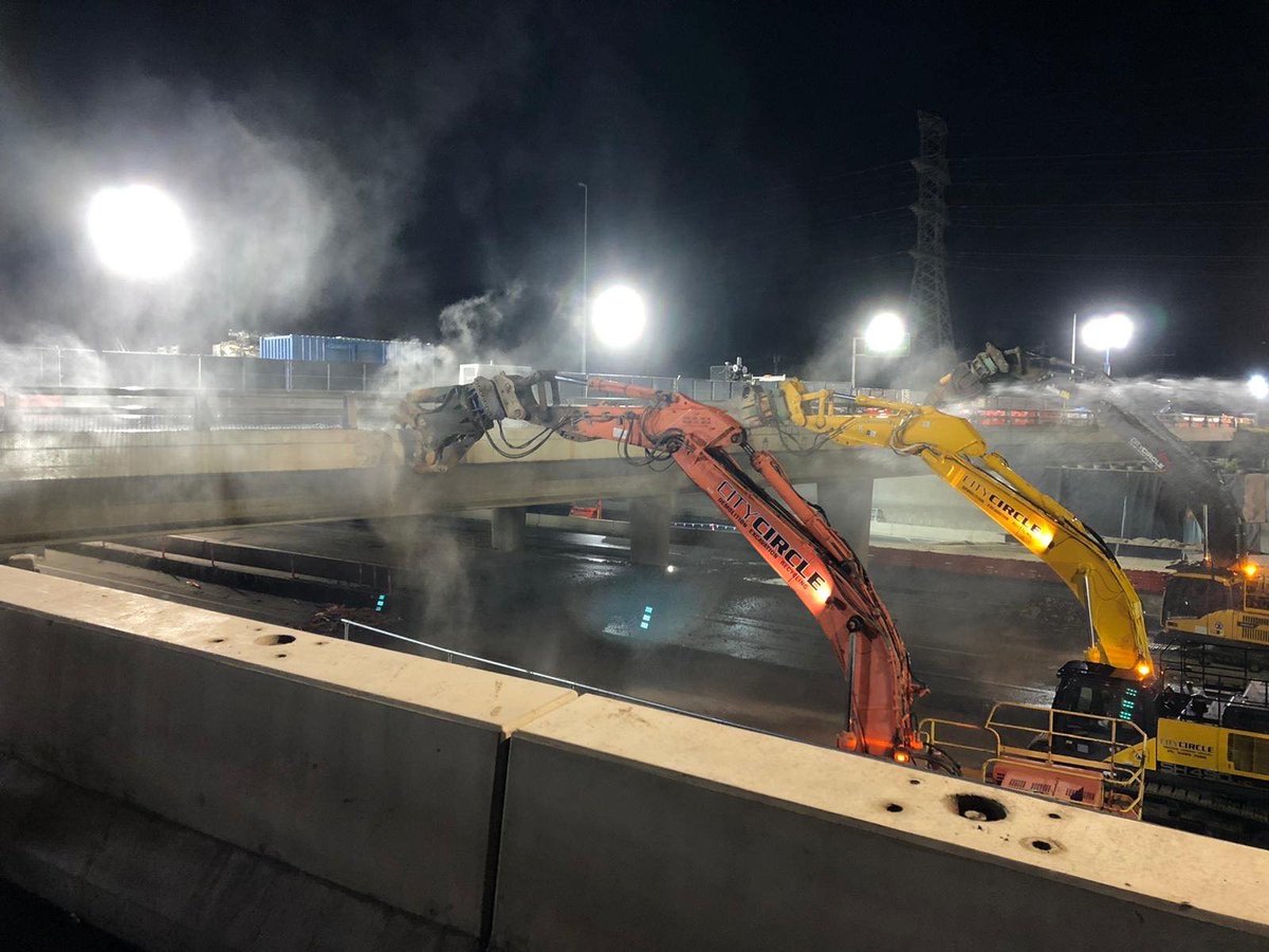 As part of the  @WestGateTunnel project, a bridge section designed in the 70s in  #Melbourne was demolished,  #thanksfortheservice. A new  #bridge with 18 precast beams is being constructed to allow widening of the freeway below.:  @WestGateTunnel:  https://westgatetunnelproject.vic.gov.au/about/latest-updates/freeway-bridge-demolished-to-make-room-for-new,-stronger-bridge