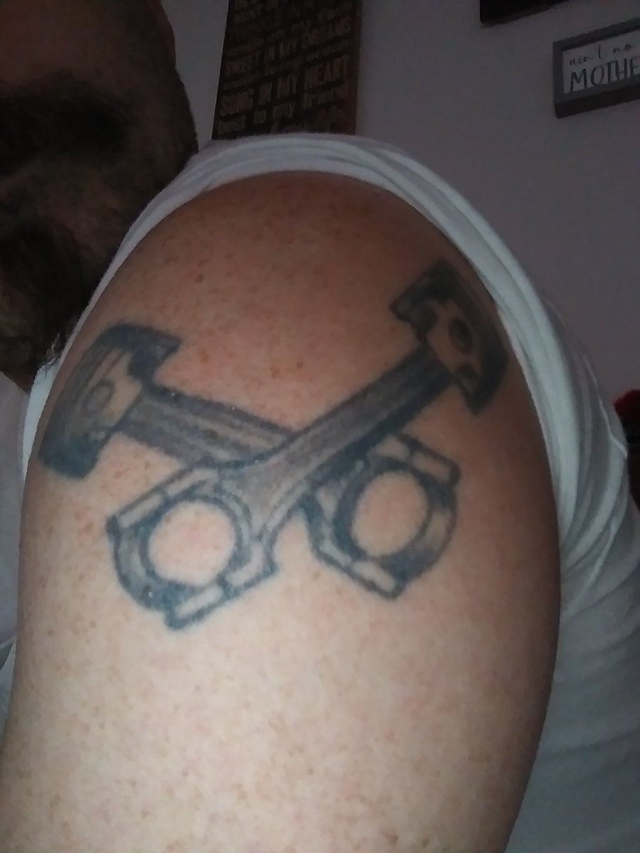 I've been asked about my automotive tattoos. This one is the oldest of 7 tattoos. Faded sadly and rough. But I love being a greaser and all of my fellow companies out there I work side by side with. Dirt track. Drag strip mud bog is where you'll find my shop at