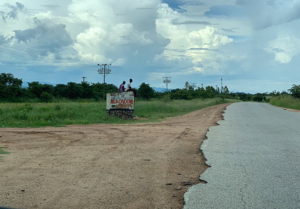 5. Years later, my late grandfather went to teach at Mukondomi School (it’s off the Murambinda - Dorowa road ) where my late uncle was born. Almost told those lads to get off the sign post, so I could get a good shot!!