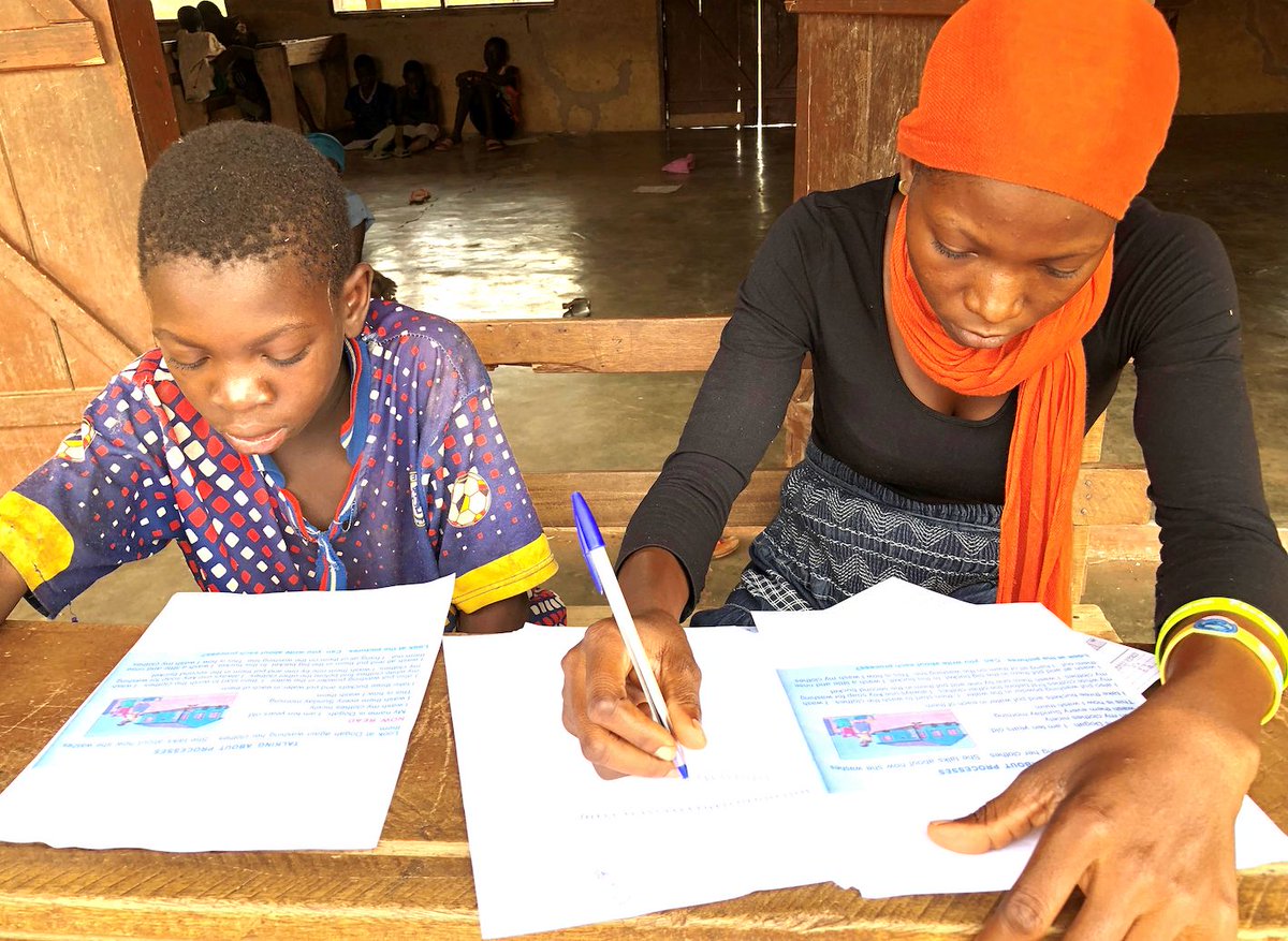 Charity assesses her students at the end of term, to see how far their reading has progressed.  Once struggling with poverty herself, with the support of Create Change, Charity has been able to impact hundreds of children and has dreams to continue doing so throughout her career.