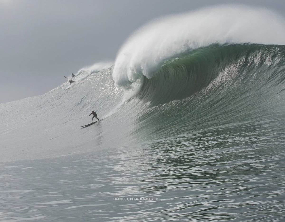 Yesterday in Half Moon Bay, California. Conditions are similarly as perfect today. Extremely rare to have this giant swell with glassy water and no wind.
My friend, the amazing big surf photographer Frank Quirarte snapped this shot!