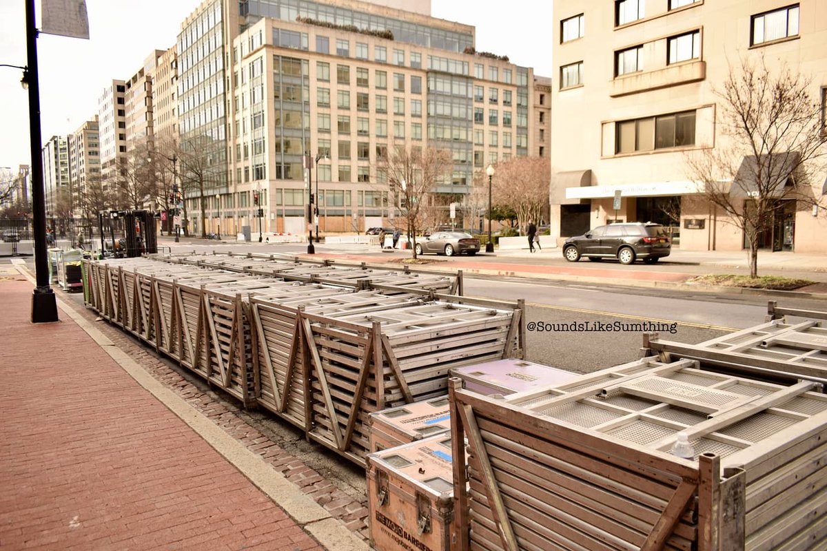 It was common to see large racks of fence around the city. As I was biking around, more and more fences were being put up, which made the streets a bit hard to navigate.