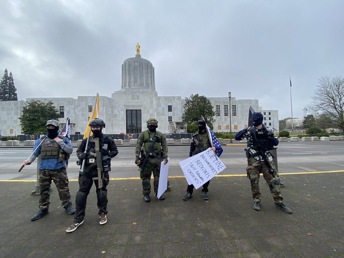 In the Oregon Capitol five boogaloo boys stand outside the statehouse