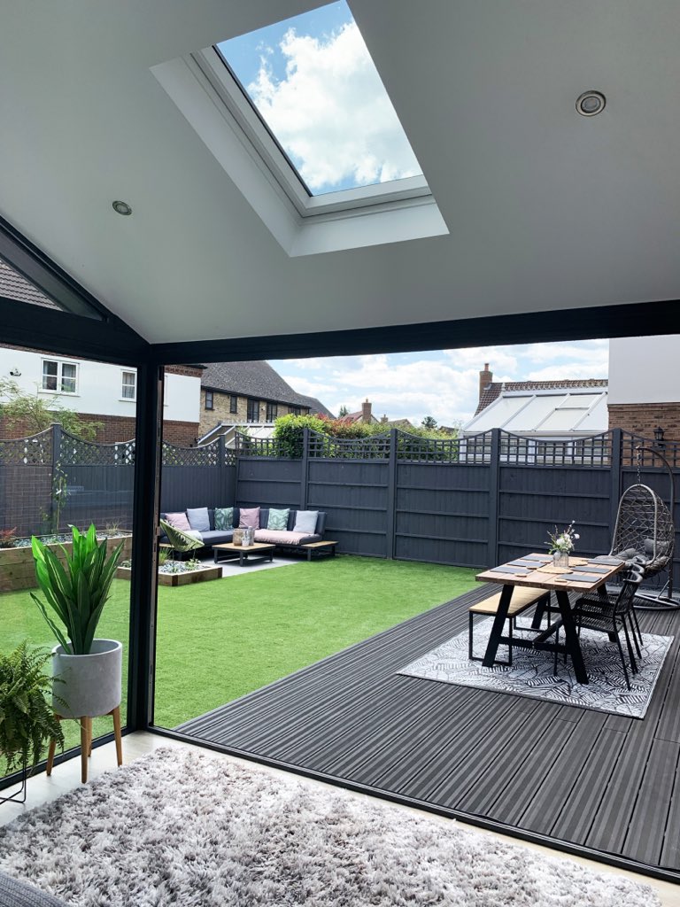 Looking for some inspiration for the summer months.   Wonderful solid roof sunroom created connecting the garden and home.