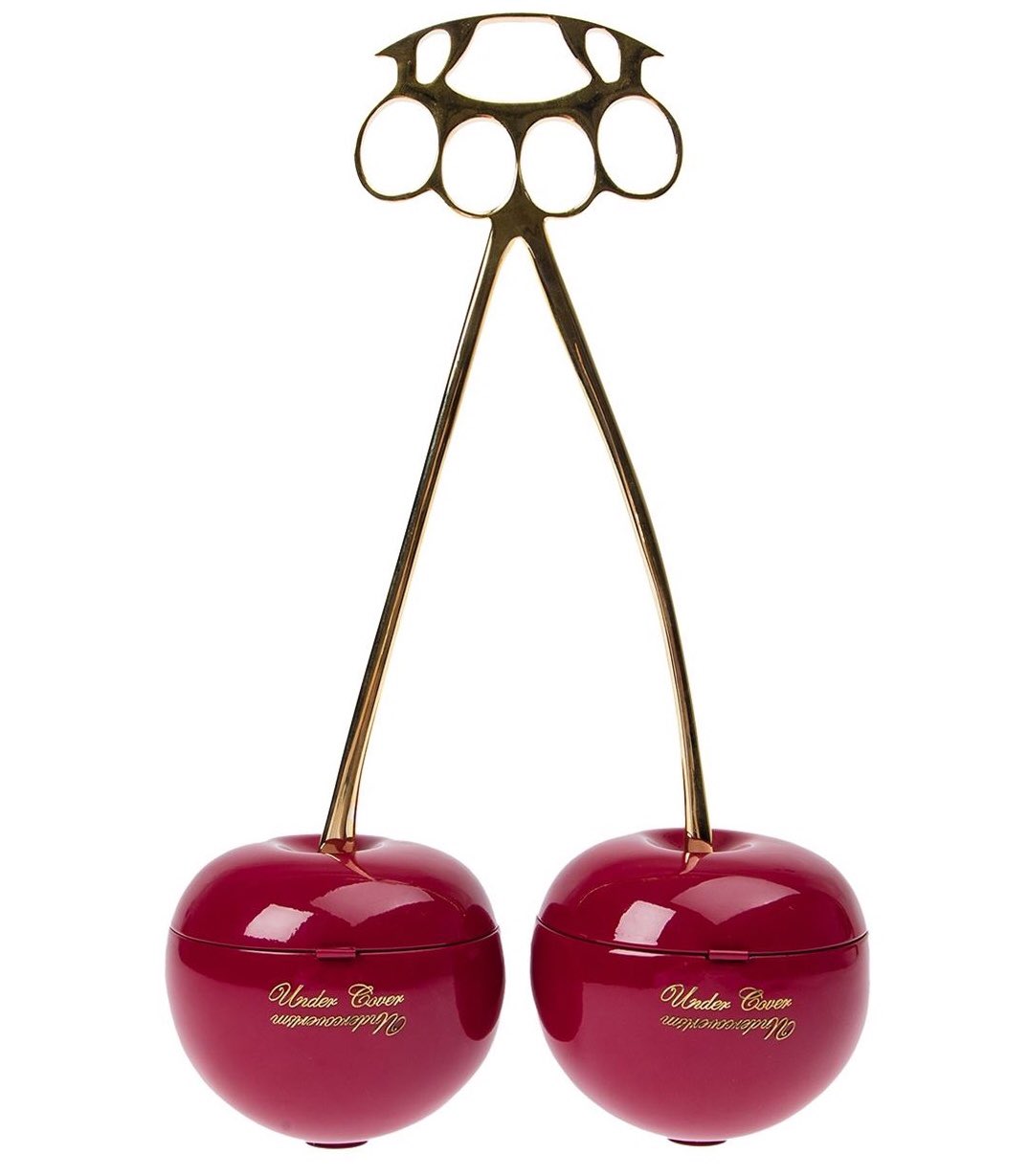 Knuckle duster clutch top
