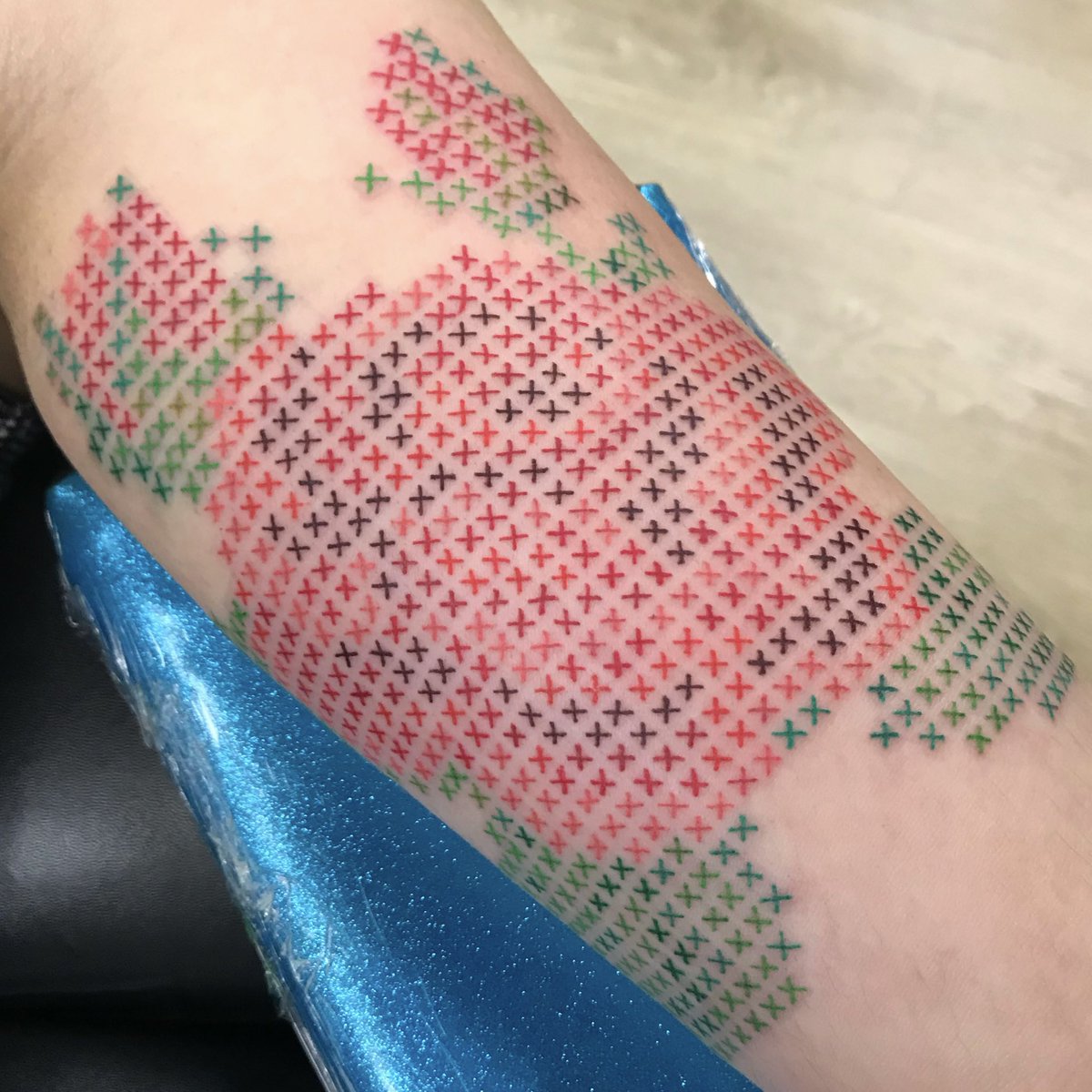 orisartstori's tweet photo. An appreciation post for the cross stitch rose tattoo I got almost 3 years ago! When I got this tattoo I had no idea I would be selling my art, but now I have my own little cross stitch business making my own designs and this tattoo is so important to me 🥺❤️ https://t.co/WytZawWupb