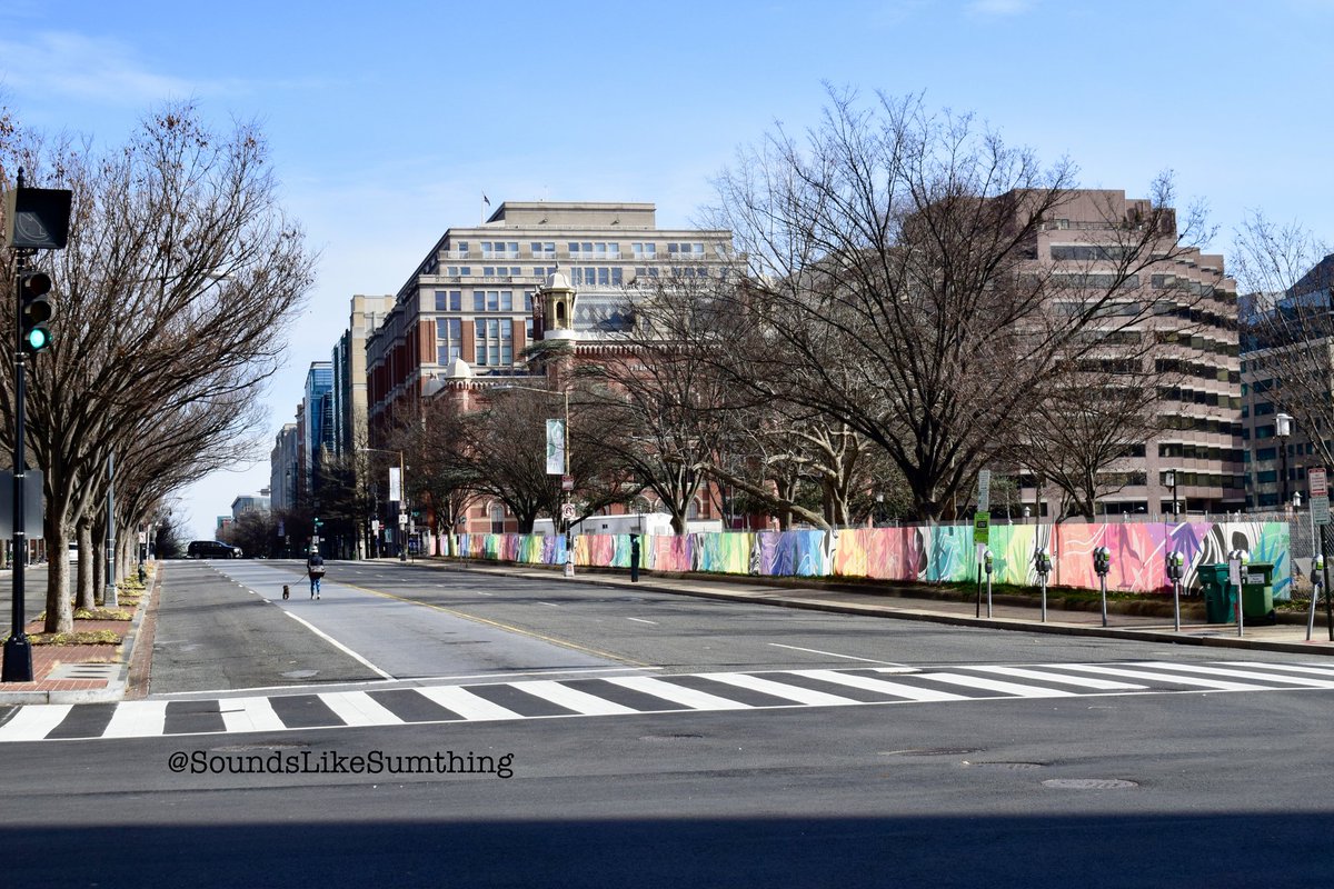 This is K St. One of the busiest roads in downtown DC. So many roads are closed that a woman was able to walk her dog in the middle of the street. I really like this pic because it captures the additional security in the city without showing the depressing side of it all