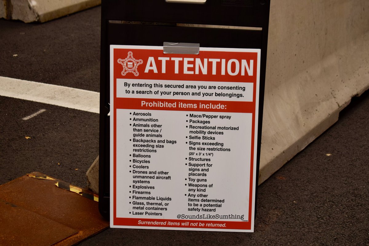 Speaking of things turning into a fortress, this is a close up of one of the checkpoints along with the list of prohibited items. The white spot below the green light says "secret service"