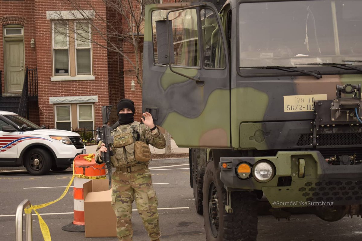 Unsettling photos continued....note this person wasn't waving, it was just a well timed shot of him shutting the door. The doggo in the 2nd pic was searching every vehicle that came through the checkpoint, including MPD