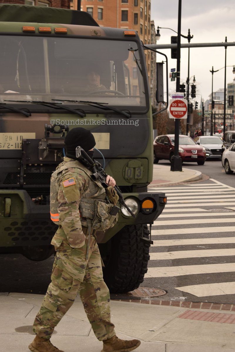 Unsettling photos continued....note this person wasn't waving, it was just a well timed shot of him shutting the door. The doggo in the 2nd pic was searching every vehicle that came through the checkpoint, including MPD