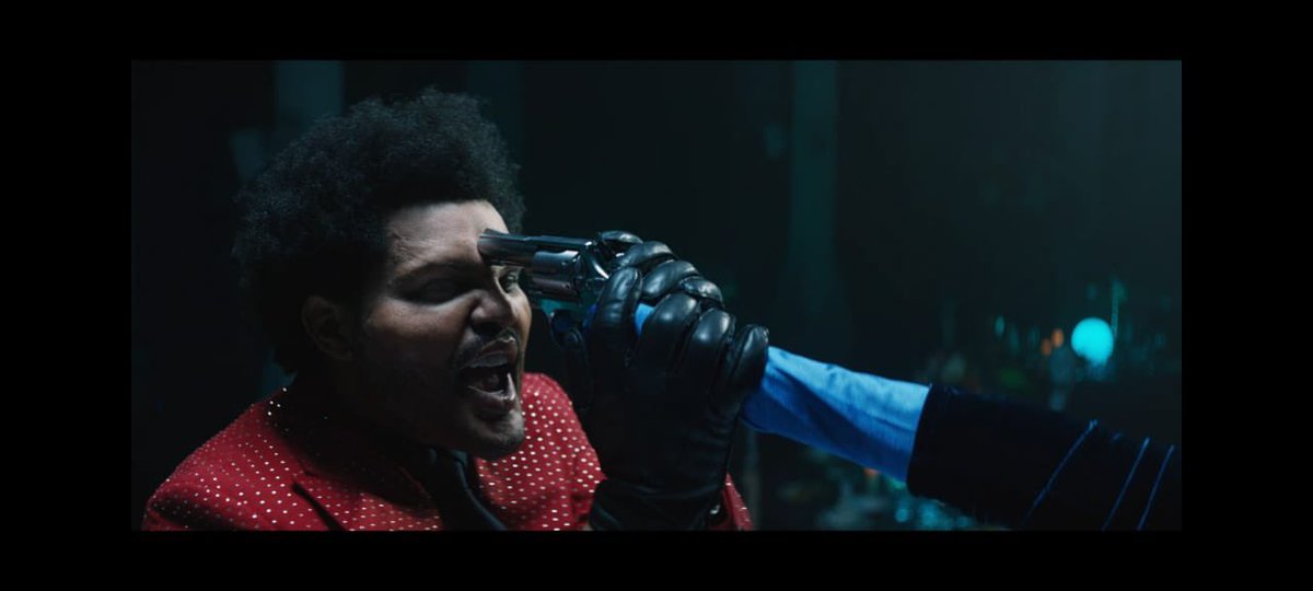 Na próxima cena, The Weeknd chama a única pessoa na sala sem máscara ao palco. Ele dança com ela, as luzes se apagam e ele, segurando a mão da mulher, aponta uma arma para a sua cabeça. Com uma expressão de assustada, ela grita, dando a entender que atirou nele.