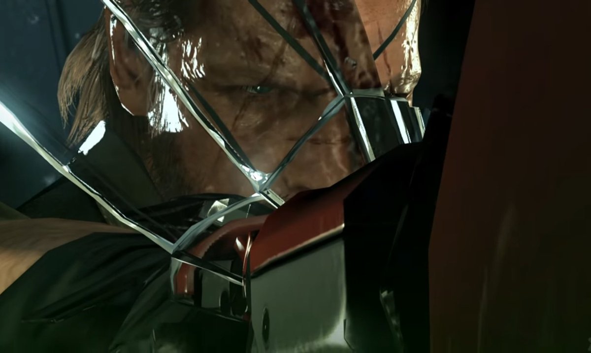 Venom Snake (Big Boss) moments before his final battle with Solid Snake in MG1. The Diamond Dogs logo in the background even turns into an Outer Heaven logo.