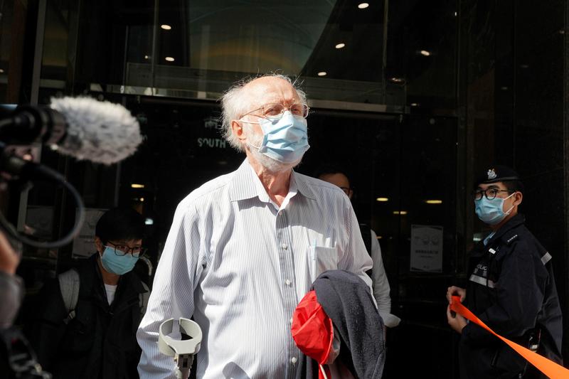 Reuters's tweet photo. American lawyer arrested by HK police in national security crackdown https://t.co/Y2rJ7Y88D2 https://t.co/TuN91U1h5y
