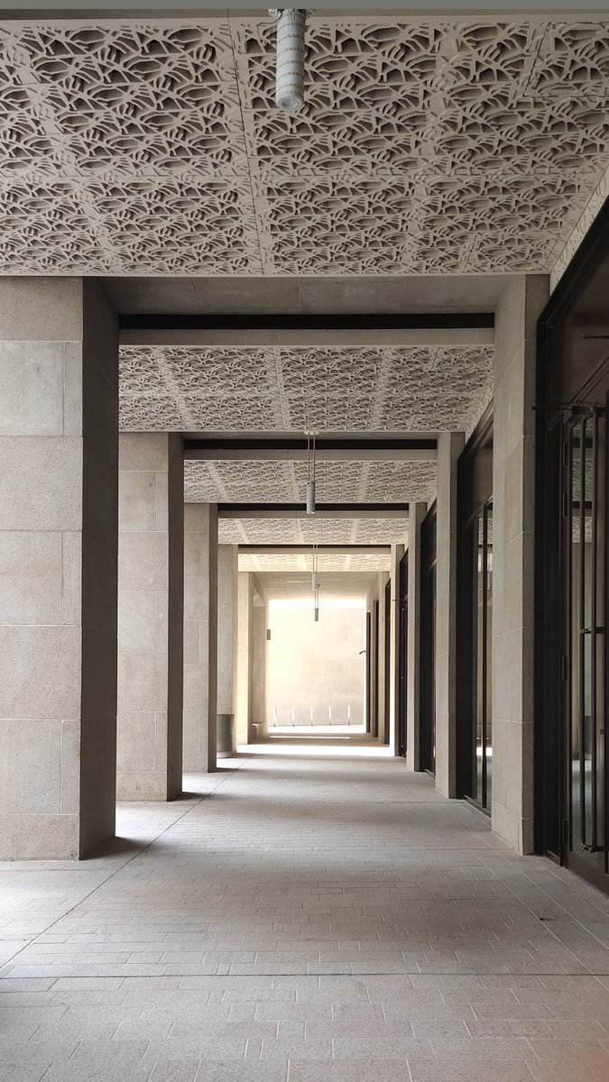 BhanusriRajesh's tweet photo. Maybe its the play of light and shadows along the path that makes me love it. Or it could be the end of the path where a new journey begins.

Either way, I'd love to walk through these halls.

#downtown #musherib #Qatar #nofilter https://t.co/8yPK5C8DIn