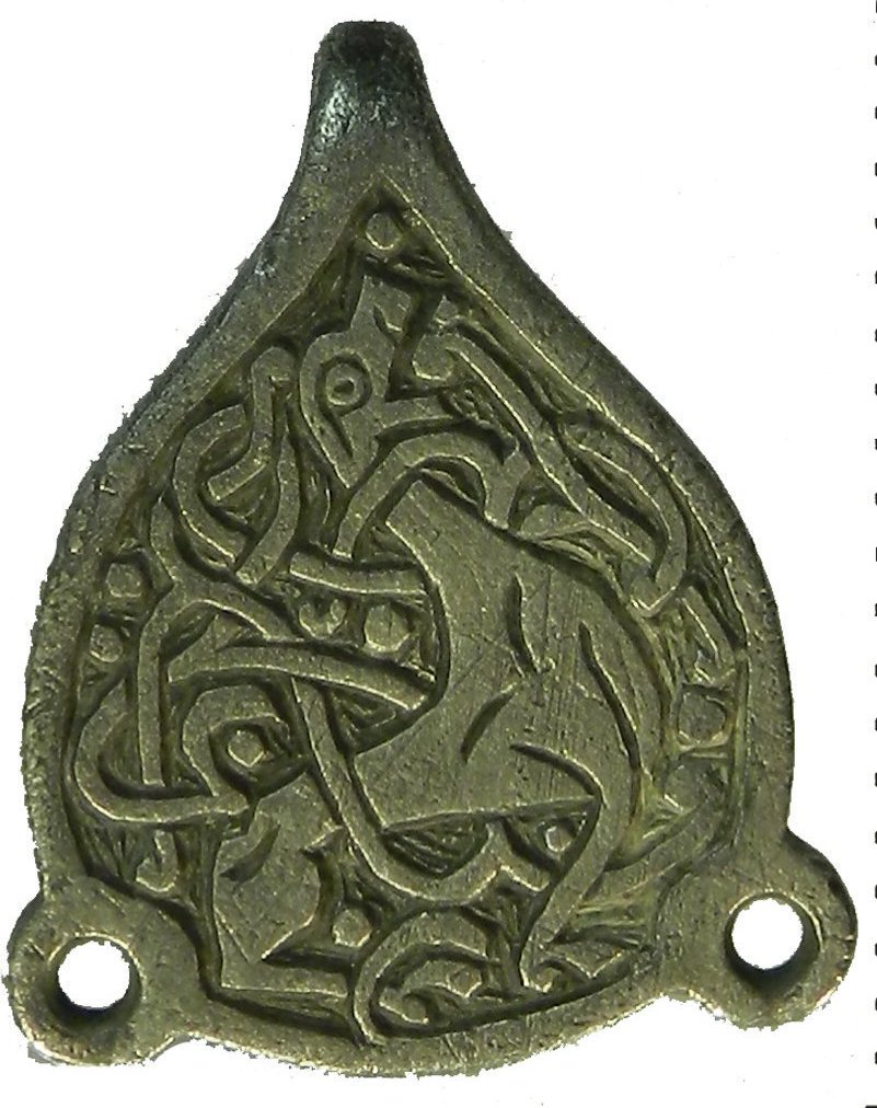 Two matching 9th-century Anglo-Saxon hooked tags with Trewhiddle-style beasts, possibly hunting dogs; found Press, Shropshire:  https://finds.org.uk/database/artefacts/record/id/560071