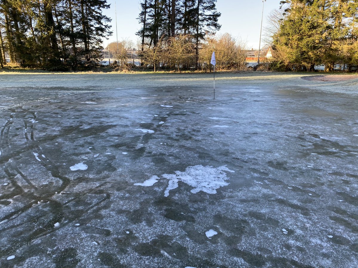 KinrossGolfClub's tweet photo. The Scottish government have allowed us to continue to play golf. The weather has other ideas unfortunately, with the courses under a thick layer of ice 🥶 it could be some time before we are playing again. Let’s hope for a quick thaw soon 🤞🏻 https://t.co/VdmLpczBK0