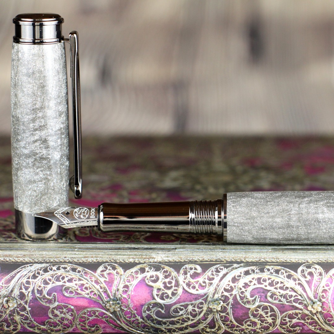 Bens_Bespoke's tweet photo. Buy - https://t.co/d4eaA6mhFJ
#FountainPen #Handmade Liquid Silver #DiamondCast Body with real #Diamonds - #Bock Stainless Steel Nib - 18 Coat glass polish finish. https://t.co/SIcLV3dHV2