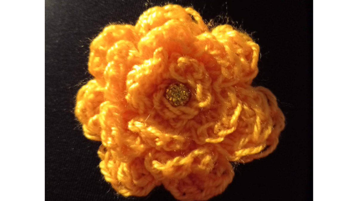 A floral brooch made as a last minute request! Loving  the vibrancy of colour. Enough to brighten up a dull day. 🧡💛 #RofS_bouquets #roseofsharonbouquets #brooch #flower