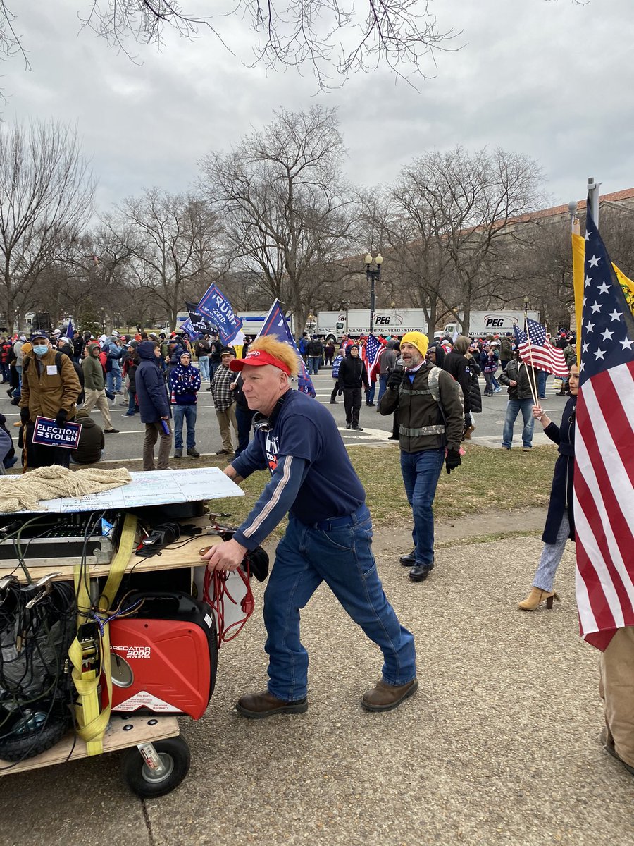 This guy is shouting over a mobile PA system that he’s going to come back here on Jan. 20 armed. “I’ve had enough. I’m ready to die for my country.”