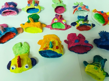 alexcollege's tweet photo. Last month our J2s and J3s spent some time exploring shape, colour, and form while creating these clay sea creatures and garden-themed tiles #CreativeAlex https://t.co/s5fO7UVNf0