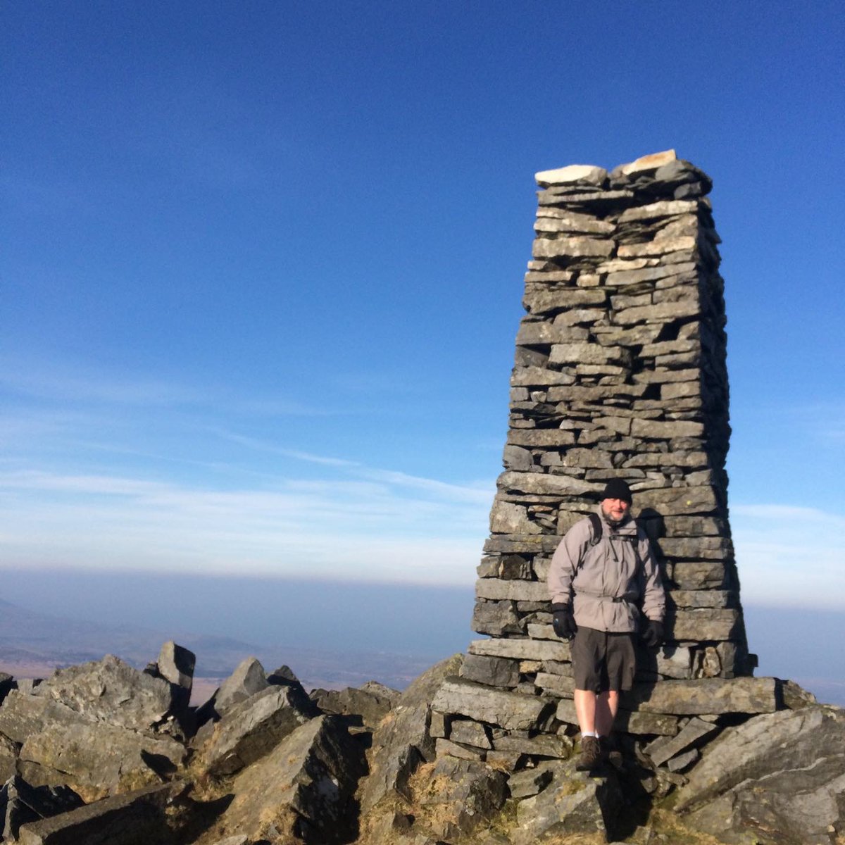 Mynydd Tal y Mignedd or Mountain at the end of the bog. The summit is crowned by a large stone obelisk, put up to commemorate Queen Victoria's Diamond Jubilee. A fine arete links it to its parent Trum y Ddysgl. 653m. <a href="/visitsnowdonia/">Snowdonia National Park</a> <a href="/visitwales/">Visit Wales 🏴󠁧󠁢󠁷󠁬󠁳󠁿</a> 

#eryriambassador