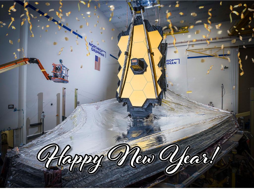 "Happy New Year" text and confetti graphics overlaid on image of the James Webb Space Telescope with its fully deployed sunshield.