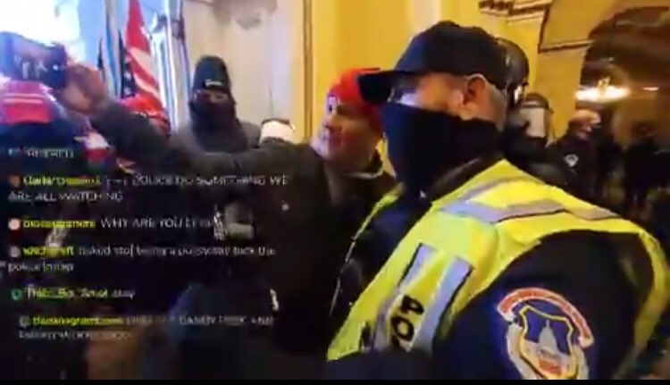 JetSetChristy's tweet photo. @bubbaprog Hey Twitter: Can anyone identify this cop or protester taking the selfie?? This disgusts me to my core! https://t.co/YZep2mXq7Z