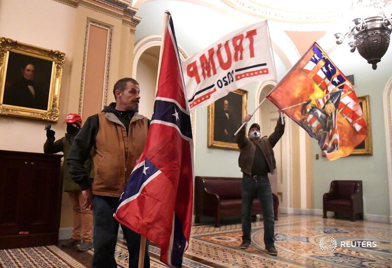 Supporters of President Trump demonstrate on the second floor of the Capitol Building near the entrance to the Senate chamber. More photos: More photos:  http://reut.rs/38mioh8&nbsp;  Mike Theiler