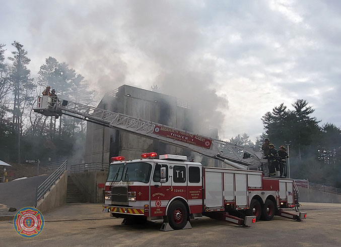 MassDFS's tweet photo. Last week, #Recruits from Bridgewater #ClassBW07 operated Tower 1 during a burn training exercise at #DFSStow Campus, burn building. https://t.co/ROU5wCisZZ