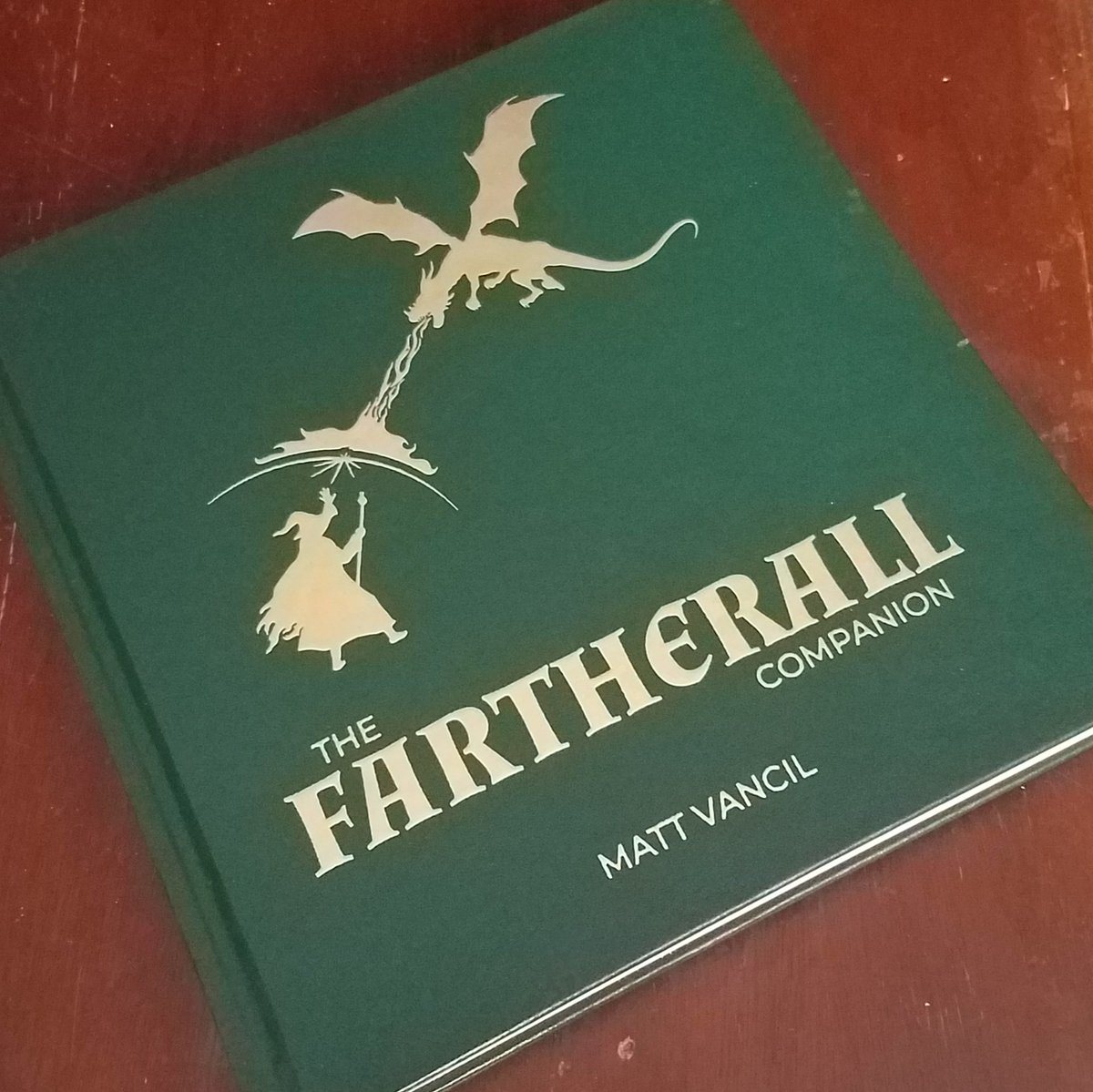 knitwitlinguist's tweet photo. Yassss, finally got this beefy boi in the mail today! It's so hefty and thick and has that new book smell...😍😍😍  Thanks so much to the lovely folks at @zombieorpheus for their delightful creativity.

#fartherall #fartherallcompanion #zombieorpheus #journeyquest https://t.co/WZFtP1IPaD