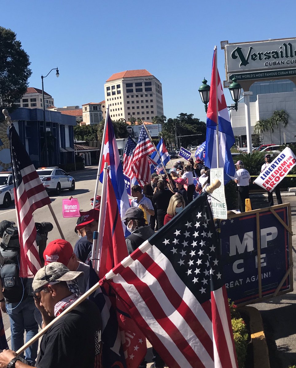 lautarogrinspan's tweet photo. The scene in front of Versailles in Miami. I’m hearing from more and more Cuban-American protesters who invoke the military and say Trump should be kept in power “by force.” https://t.co/5lYyVNIikH