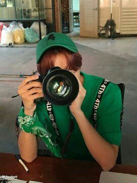 He is clicking ur photos say cheese 