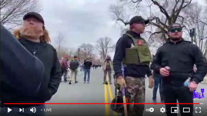 13/ That's Proud Boys founder Gavin McInnes in the black baseball hat, classes, and plate carrier.Beside him is Proud Boys Elder Ethan "Rufio Panman" Nordean.