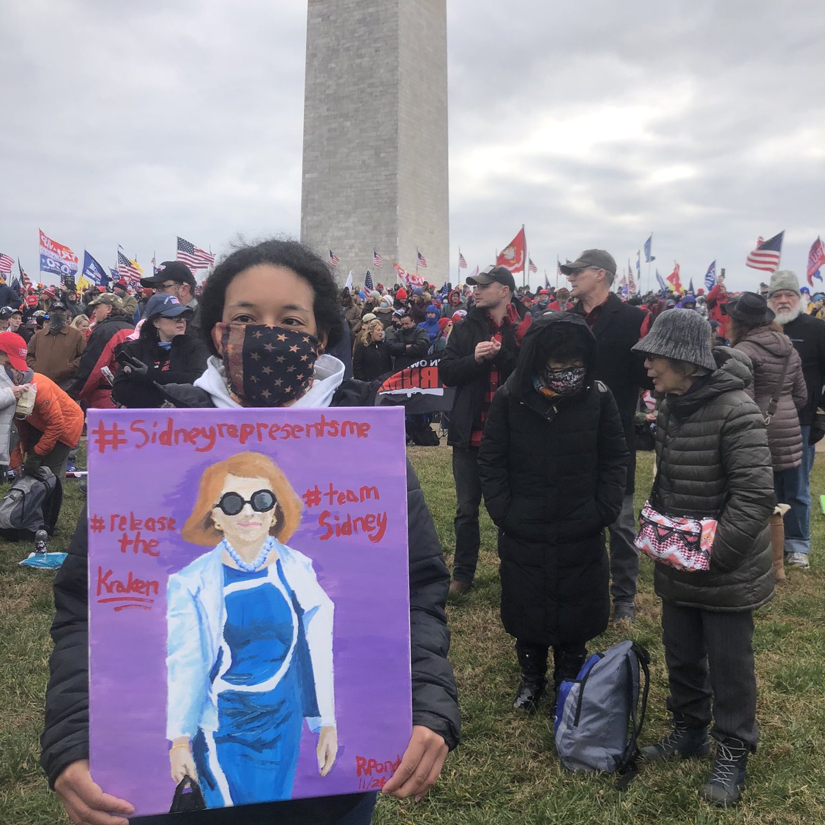 thatartgrl's tweet photo. @JackPosobiec @SidneyPowell1 Young artist repping @SidneyPowell1 in DC at the #SaveAmericaRally #ReleaseTheKracken 😎 https://t.co/zjXQZd8VMB